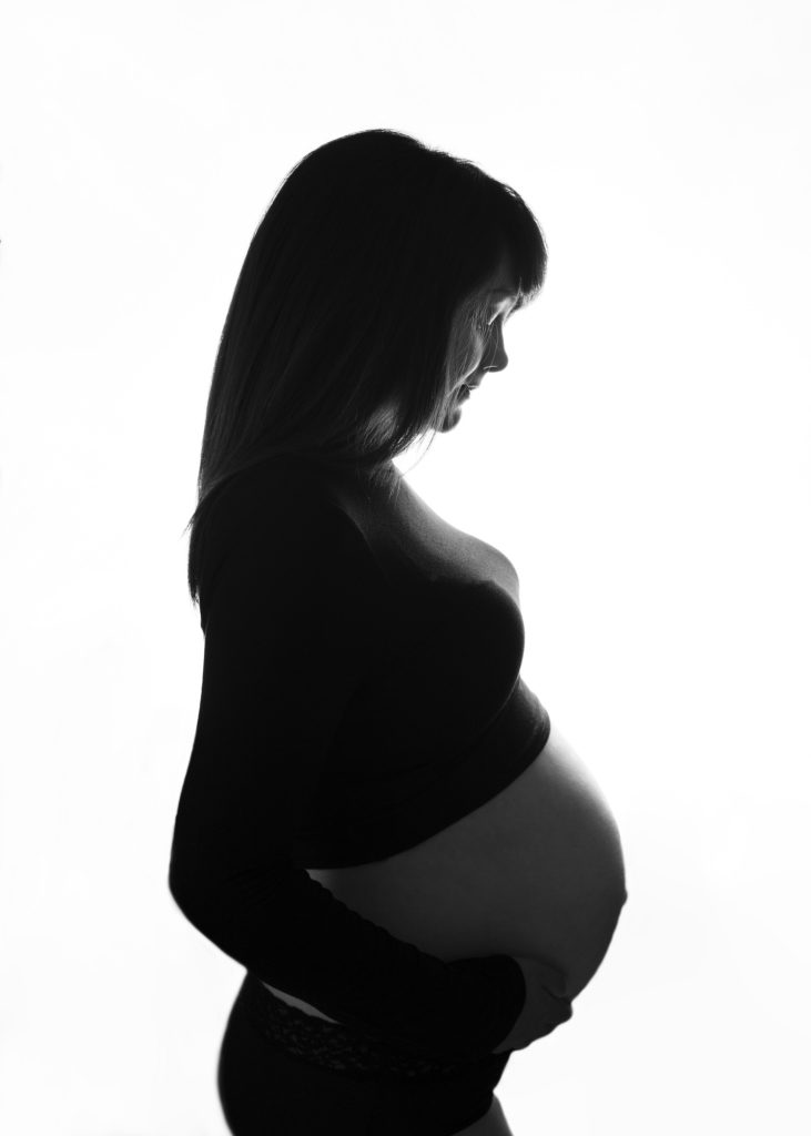 black and white pregnant lady with white background